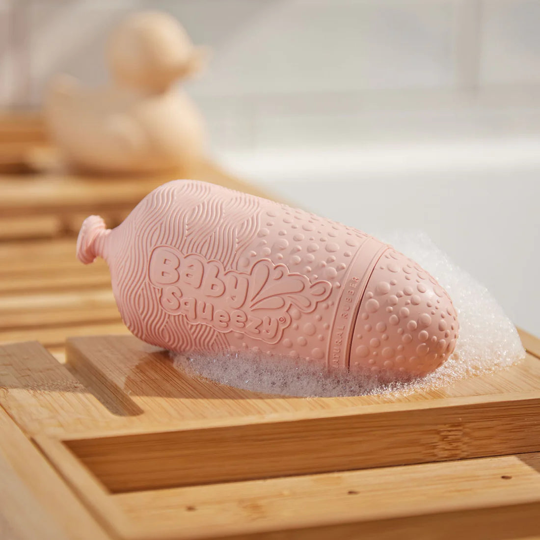 BabySqueezy - Natural Rubber Teether & Bath Aid | Flamingo